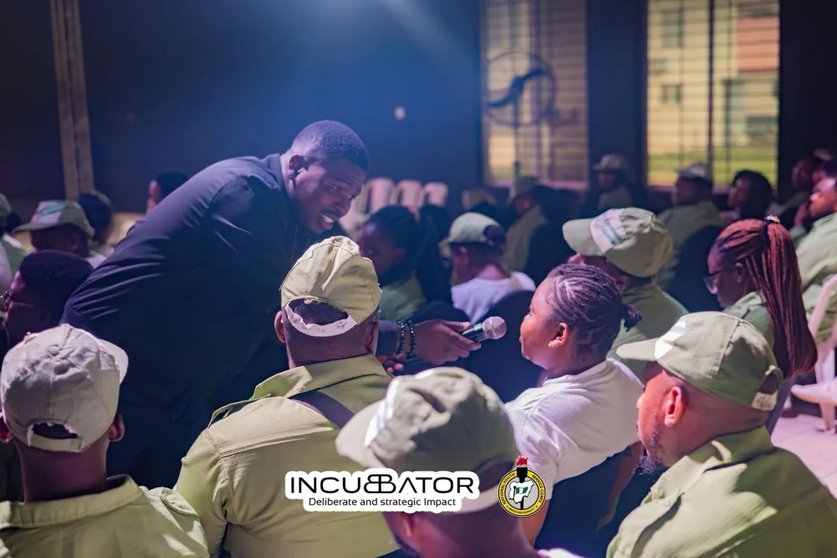 Facilitator guiding NYSC corps members during SAED training